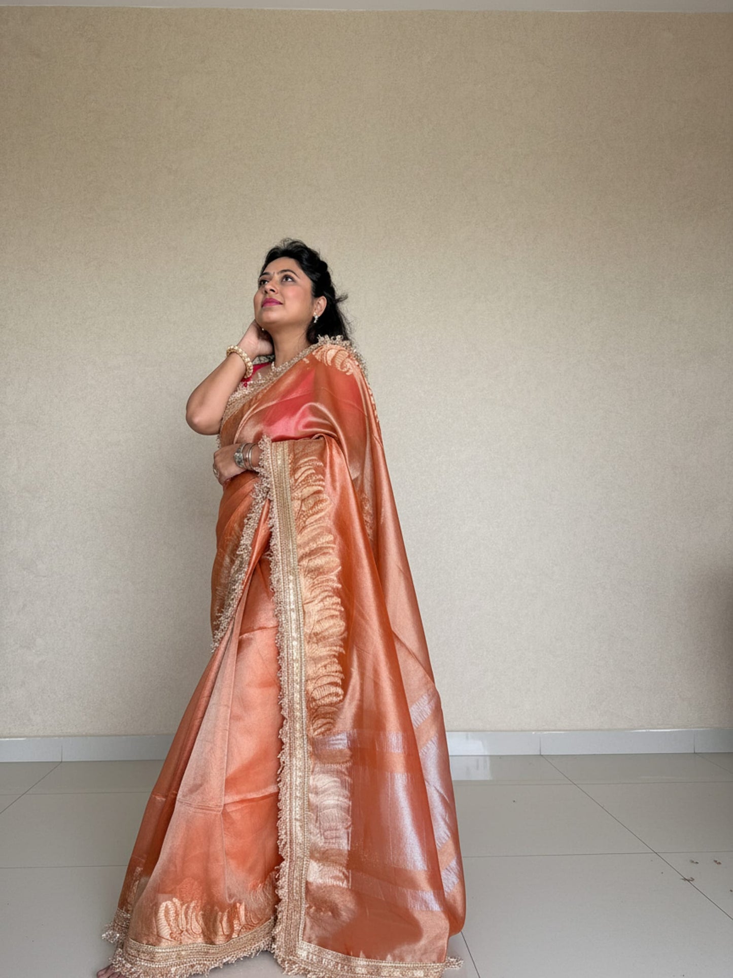Orange Tissue Saree With Broad Lace