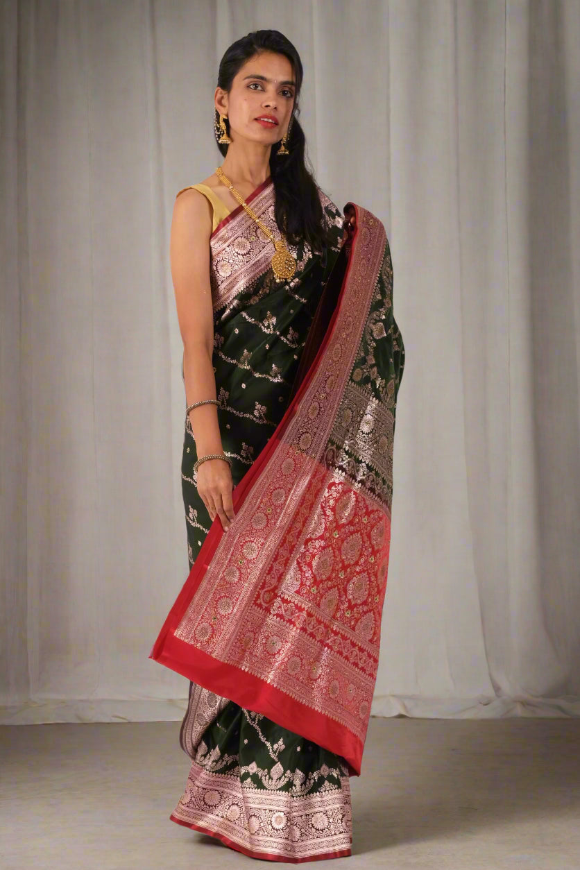 Front pleats of Mehendi Green Semi Katan Stone Banarasi saree by Silken Saga